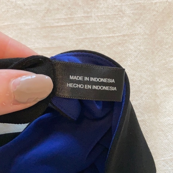 Norma Kamali black long sleeve dress with cutout neckline design. - Picture 3 of 9